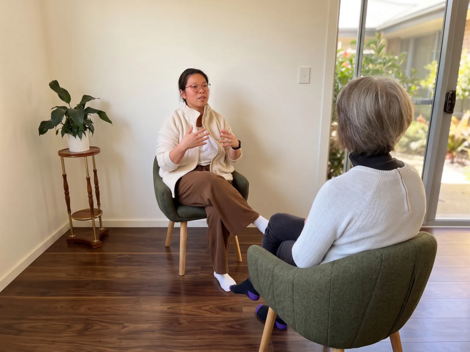 A counselling session in a calm, light-filled room at Safe Refuge